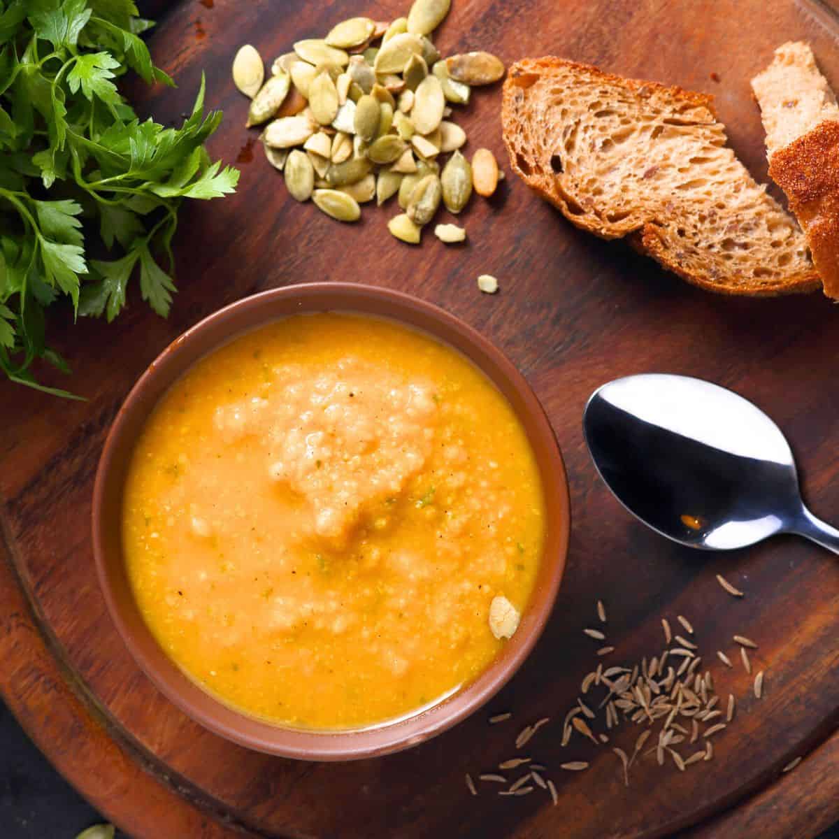 A bowl of pumpkin soup made after reading these winter soup recipes