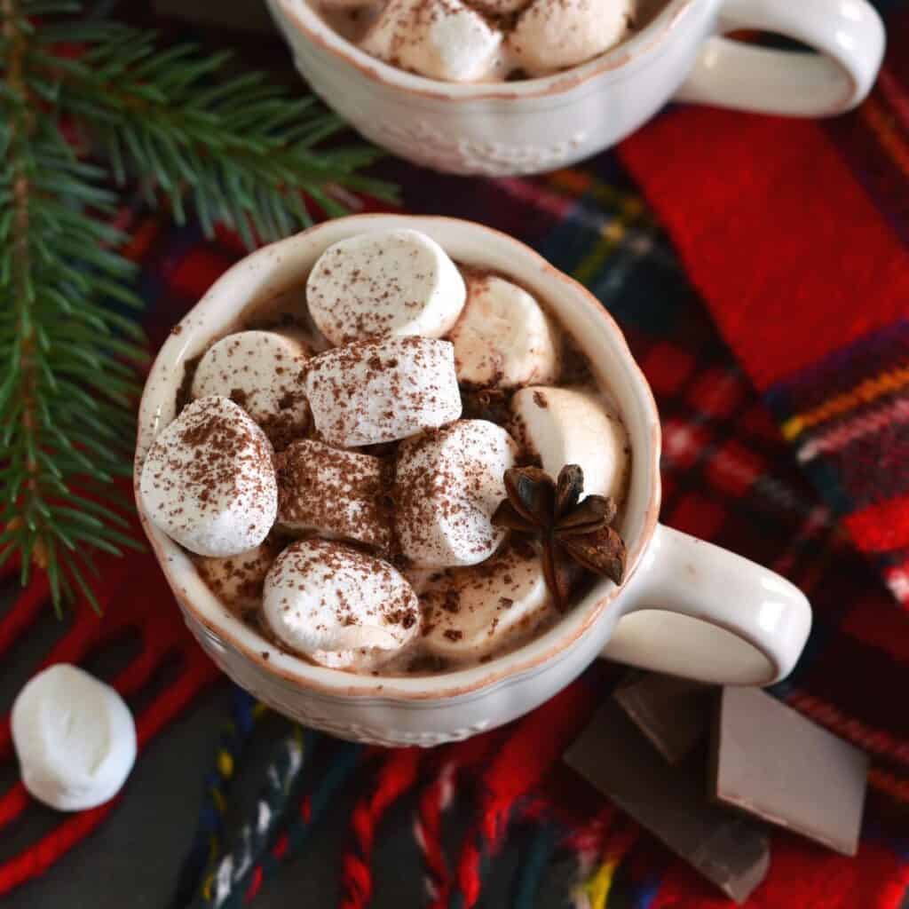 A hot chocolate with candy canes and spices