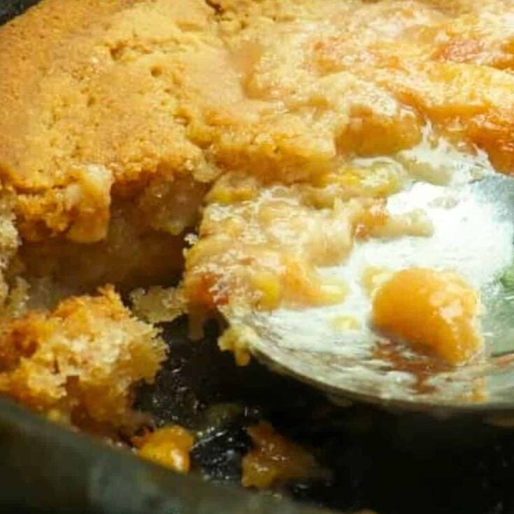 Peach cobbler in a cast iron skillet