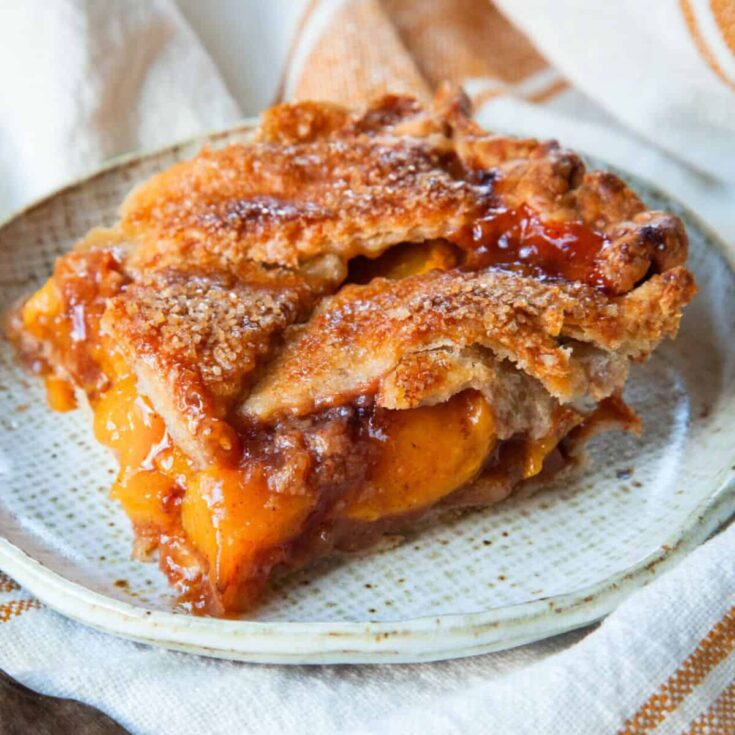 A slice of peach slab pie