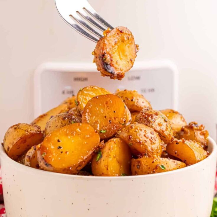 A bowl of slow cooker honey mustard potatoes