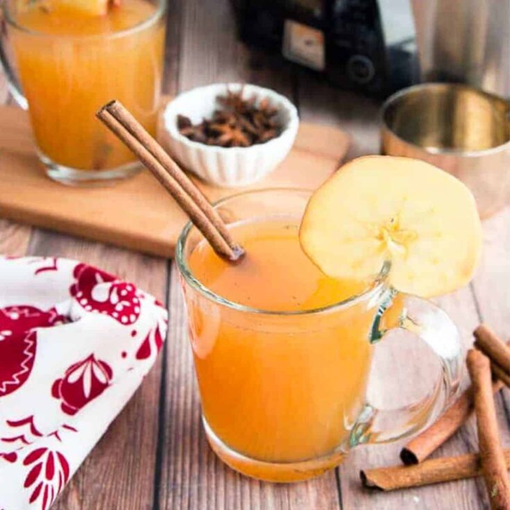 A cup of spiced apple cider drink