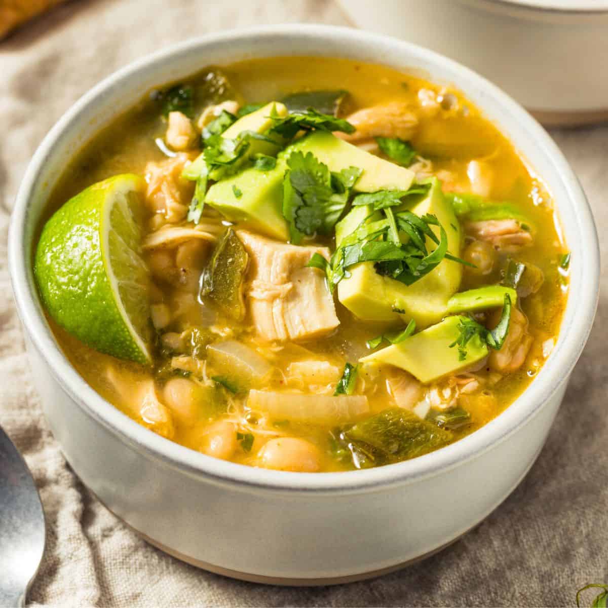 A bowl green chicken chili soup, made after reading chicken chili recipes