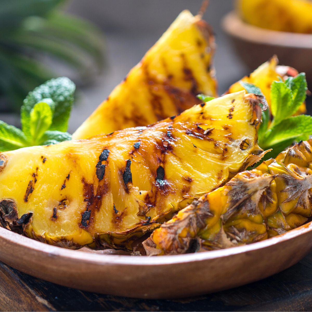 Grilled pineapple wedges, made after reading these pineapple desserts