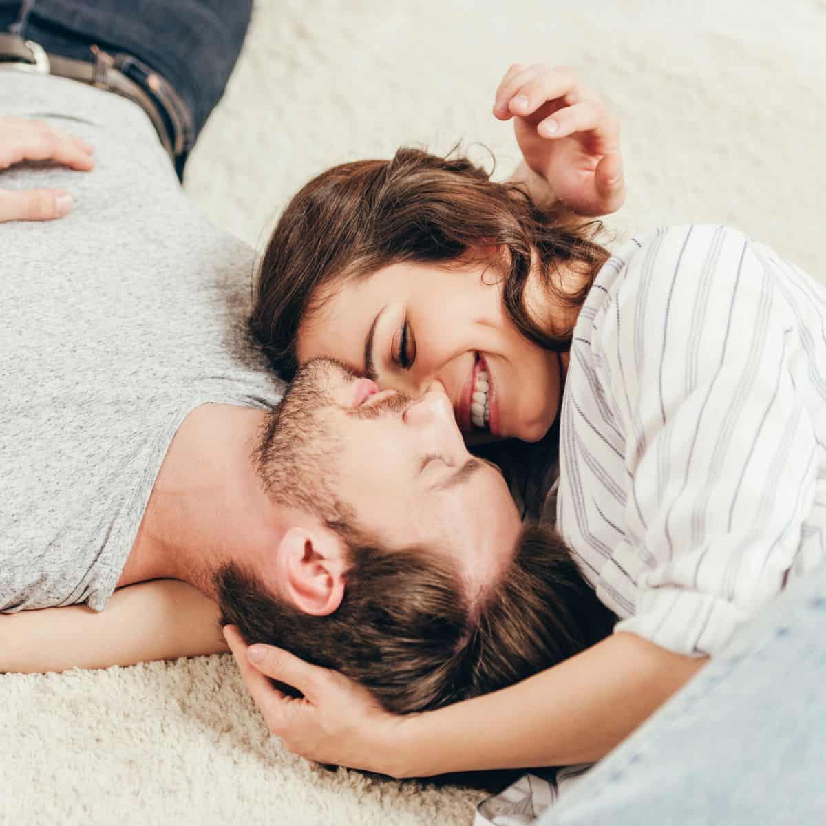 A happy couple cuddling. Soulmate quotes.