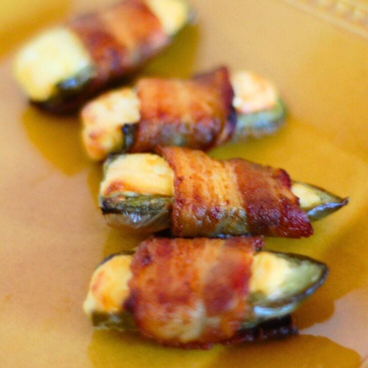 Bacon wrapped Jalapeno poppers, made after reading these Jalapeno popper recipes