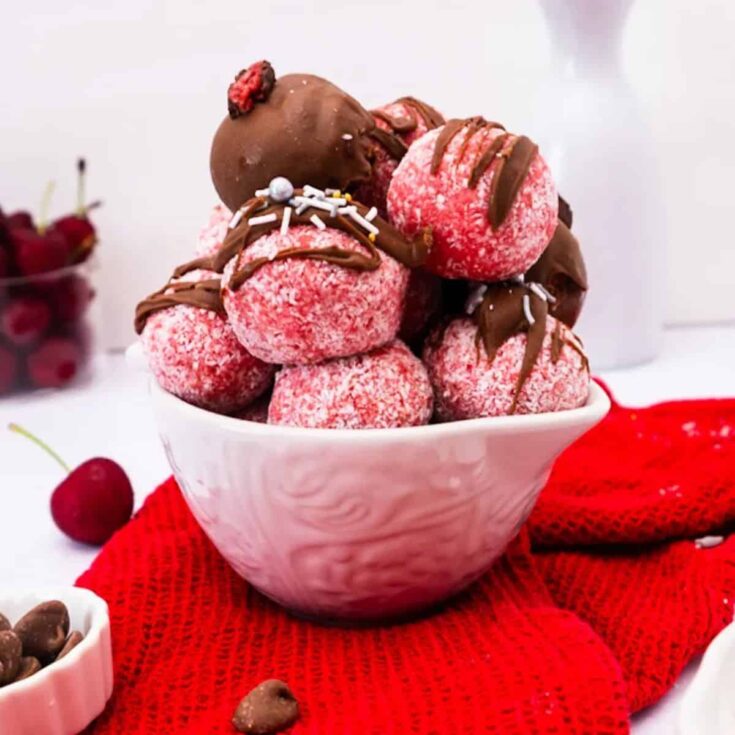 A bowl of pink ripe ball desserts