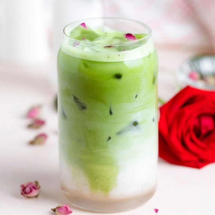 Non alcoholic green iced rose matcha latte drink