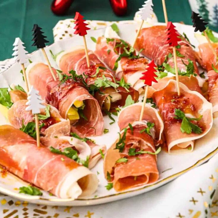 Prosciutto-wrapped pear and cheese rolls