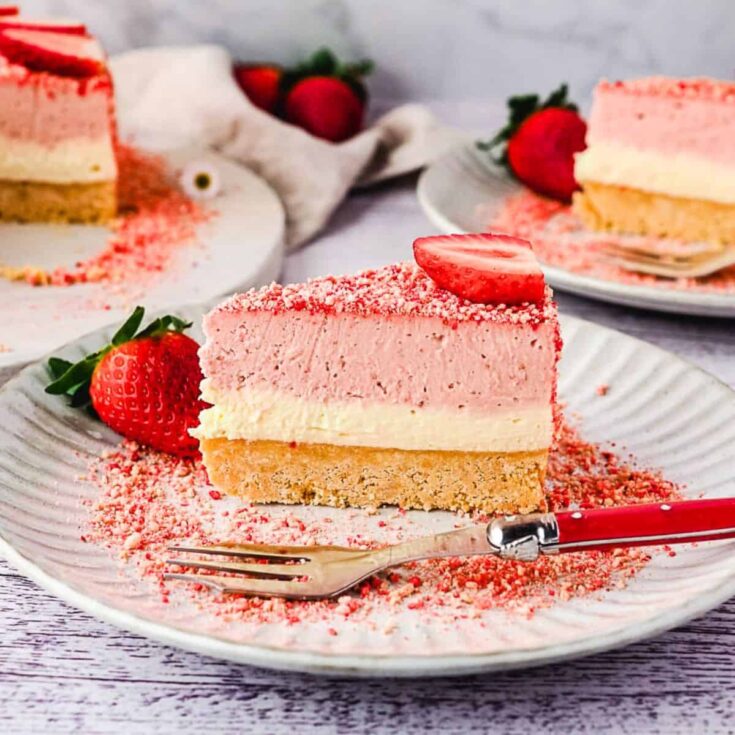 A slice of strawberry crunch cheesecake