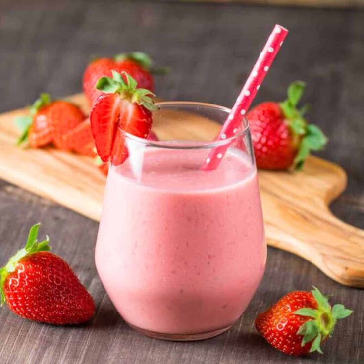 A glass of strawberry milk