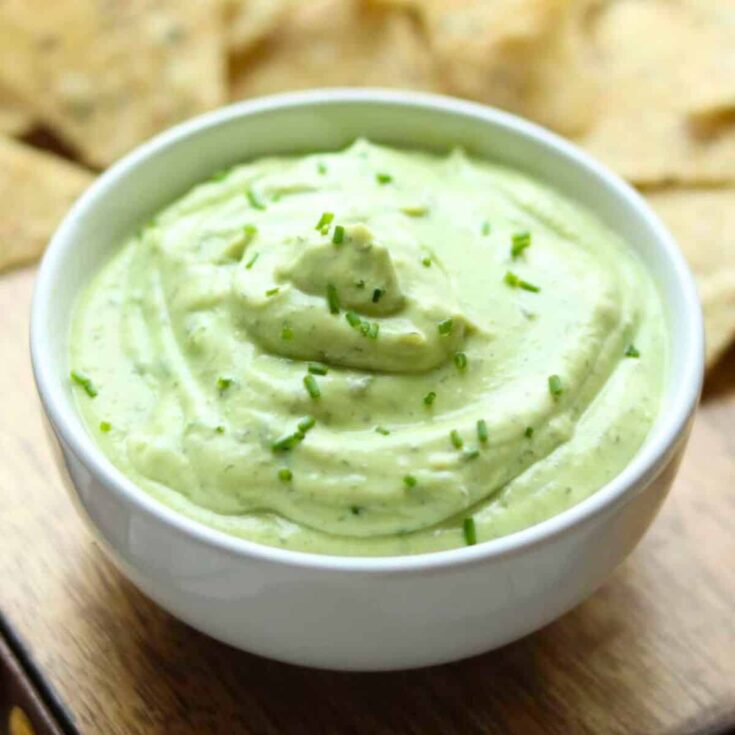 A bowl of avocado ranch dip with greek yogurt