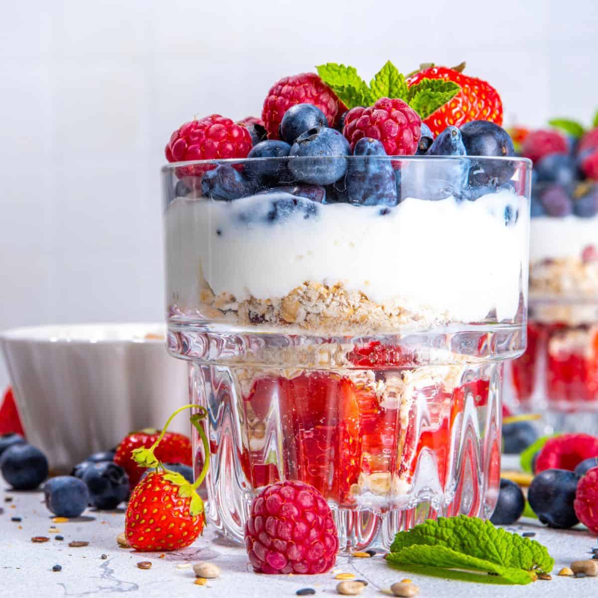 A glass of blueberry, strawberry, and raspberry truffle, made after reading these 4th of July breakfast ideas