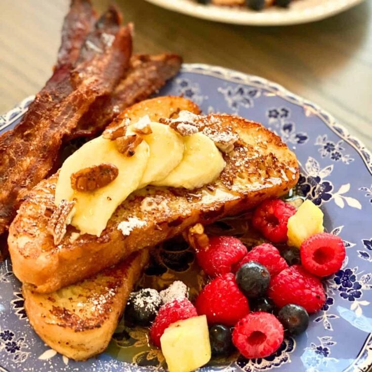 A plate of banana custard French toast