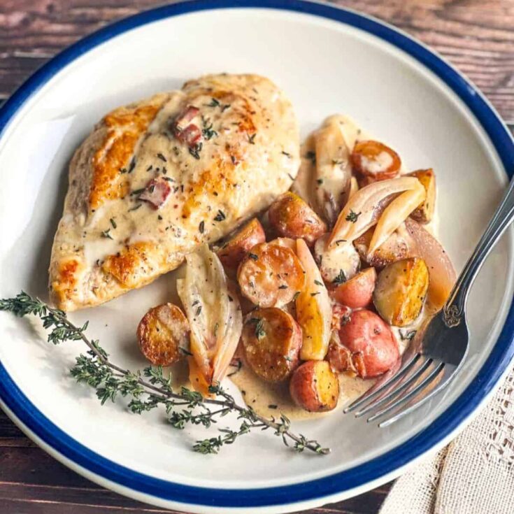 A plate of chicken and potatoes, made after reading these Fall dinner party recipes