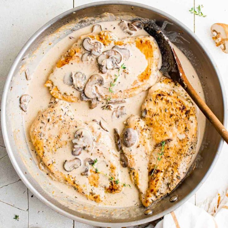 Creamy mushroom chicken on a pan, made after reading these Fall dinner party recipes