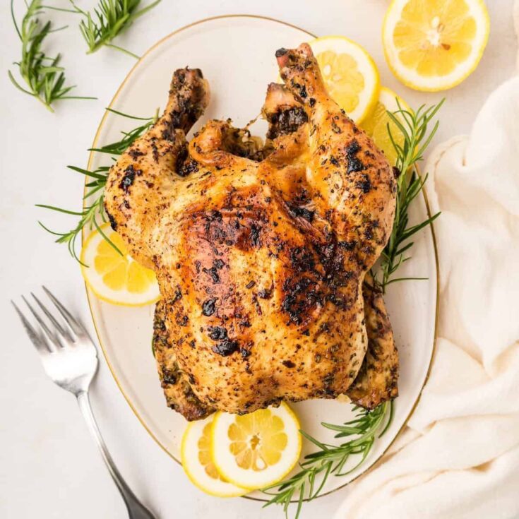 Lemon rosemary chicken on plate, made after reading these Fall dinner party recipes